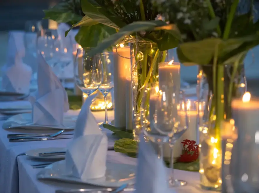 Elegantly set table with lit candles
